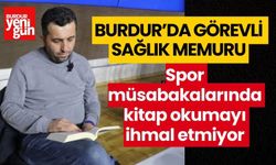 Burdur'da sağlık memuru, görevli olduğu spor müsabakalarında kitap okumayı ihmal etmiyor