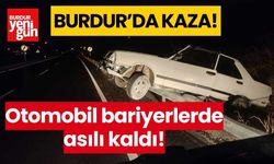 Burdur'da otomobil bariyerlerde asılı kaldı!