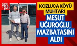 Kozluca Köyü Muhtarı  Mesut Uğuroğlu Mazbatasını Aldı