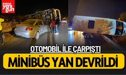 Otomobil ile çarpışan servis minibüsü yan yattı