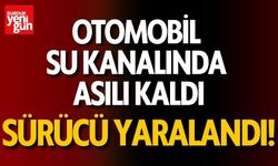 Otomobil su kanalında asılı kaldı, sürücü yaralandı