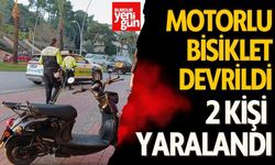 Devrilen motorlu bisikletteki 2 kişi yaralandı