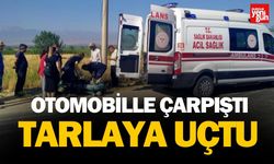 Otomobil ile çarpışan motosiklet sürücüsü tarlaya uçtu