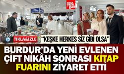 Burdur’da yeni evlenen çift nikâh sonrası kitap fuarını ziyaret etti