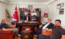 BAŞKAN MEÇİKOĞLU’NA ANLAMLI PLAKET