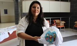 Antalya'da üniversite öğrencileri depremzede çocukların hayallerini tişörtlere taşıdı