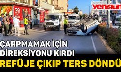 Direksiyonu kırdı, refüje çıkıp ters döndü