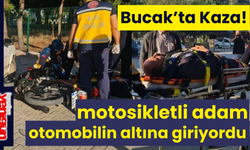 Bucak'ta Motosikletli Adam Otomobilin Altına Giriyordu!