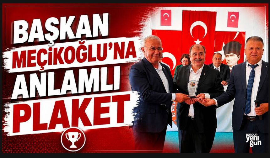 BAŞKAN MEÇİKOĞLU’NA ANLAMLI PLAKET